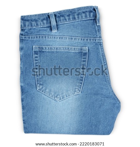 Folded Light Blue Denim Jeans Isolated On White Background 