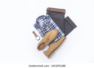 Folded Long Sleeve Plaid Shirt And Khaki Pants With Belt And Brown Suede Shoes ,watch On White Background
