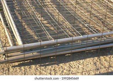 Folded Metal Mesh Fence. Temporary Fencing Of The Territory.