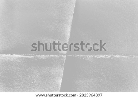 Folded paper texture with shifted midtone crossing crease