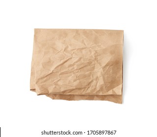 Folded Sheet Of Brown Crumpled Paper Isolated On White Background, Top View