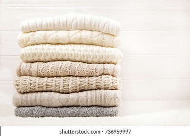 sweaters Folded wooden background