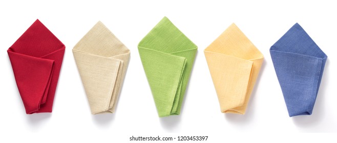 folded table cloth napkin at white background, top view