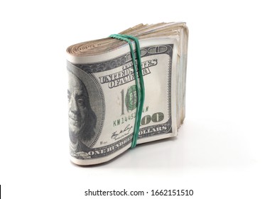 folded wad of money isolated - Shutterstock ID 1662151510