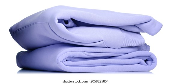 Folded warm clothes hoodie and pants on white background isolation - Shutterstock ID 2058225854