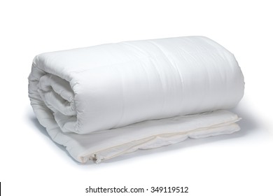 Folded White Quilt On White Background