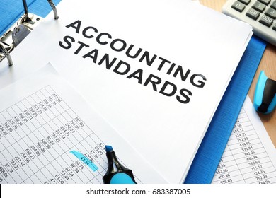 Folder With Documents Accounting Standards On A Table.