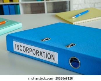 Folder With Documents For Incorporation On The Desk.