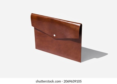 Folder from genuine leather handmade for papers and documents on a white isolated background