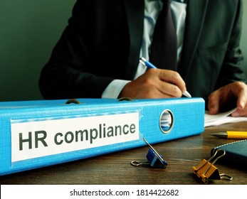 Folder With HR Compliance Papers And Manager.