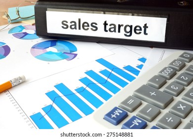 Folder With The Label Sales Target  And Charts