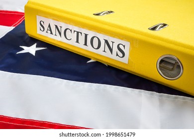 Folder With Sanctions Law And USA Flag.