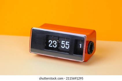 folding clock vintage retro watch clock 70s 60s object isolated number 23 55 alarm calendar used flip clock time antique space age design 1970 analog red pattern awake radio alarm counter final   - Shutterstock ID 2115691295