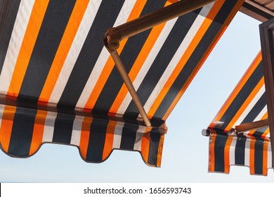 Folding Patio Balcony Awning, Side Sun Shade Under Bright Summer Sky