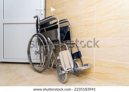 Similar – Senior woman in a wheelchair alone