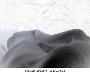 folds of white snow with shadows and abstract background