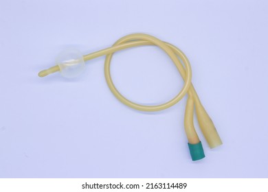 Foley Balloon Catheter Or Urinary Balloon Catheter On Blue Background