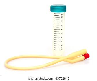 Foley Catheter and Plastic Test Tube on White Background