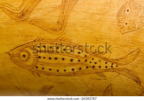 folk art\
fish carving on 1800\'s powder horn\
detail