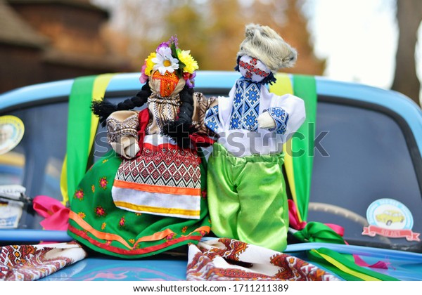 Folk doll. Motanka. Wedding
Car Decorations. Ukrainian doll-motanka or rag doll. Handmade
textile doll ancient culture folk crafts tradition of Ukraine.
Yarn. 