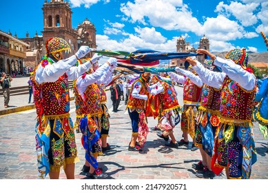 folkloric people dancing in festivities of Peru