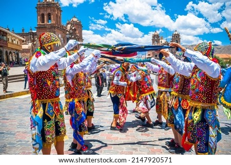 folkloric people dancing in festivities of Peru