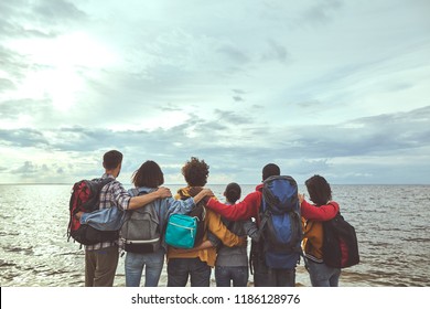 Folks trip. Portrait of group of relatives travelling to the seashore