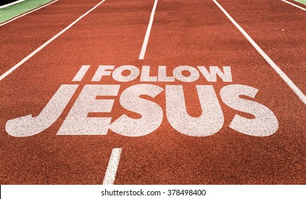 I Follow Jesus written on running track
