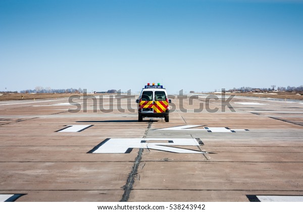 Follow me car at the airport\
runway