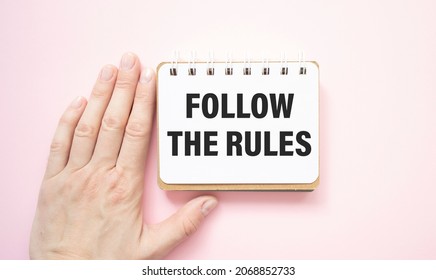 follow the rules text on notepad, business concept background