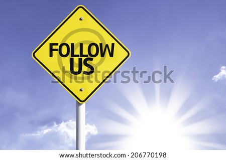 Follow Us road sign with sun background 