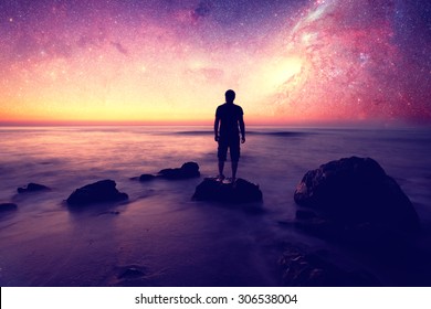 Follow your dreams, silhouette of man and many stars- elements of this image are furnished by NASA - Shutterstock ID 306538004