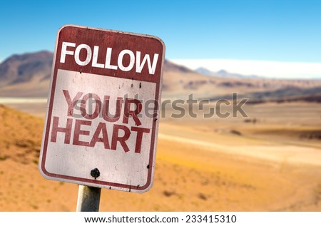 Follow Your Heart sign with a desert background