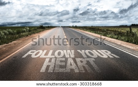Follow Your Heart written on rural road