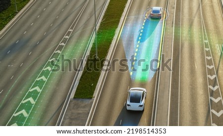 Following Aerial Top Down Drone View: Autonomous Self Driving Car Moving Through City Highway, Overtaking Cars. Visualization Concept: AI Sensor Scanning Road Ahead for Vehicles, Speed Limits