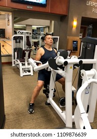 FOLSOM, CA, USA - June 2, 2018: Man Working Out On Lifetime Fitness 