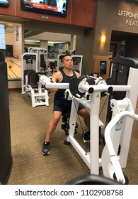 FOLSOM, CA, USA - MAY 23, 2018: Man Working Out At Gym, Lifetime Fitness. 