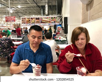 FOLSOM, CA, USA - OCT 8, 2018: Costco Food Court By The New Self Serve Kiosk, Customers Eating Ice Cream.