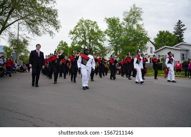 Fond Du Lac, Wisconsin / USA - May 27th, 2019: Fond Du Lac Cardinals High School Musical Marching Band Marched In The 2019 Fond Du Lac Memorial Parade.