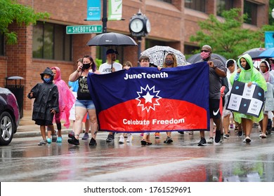 Fond du Lac, Wisconsin  USA - June 20th, 2020: Ebony vision members and community members took to the streets of Fond du Lac to honor and remember juneteenth day the end of slavery in america.