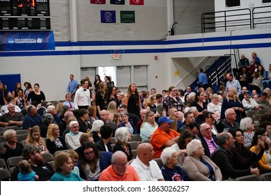 Fond Du Lac, Wisconsin USA - March 19th, 2019: People Of The Community Gathered In A Gym For A City Meeting. 