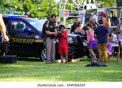 Fond Du Lac, Wisconsin USA - June 20th, 2020: Community Families And Children Enjoying Themselves With Local Police Officers And Sheriffs During Police Officer Appreciation Day.