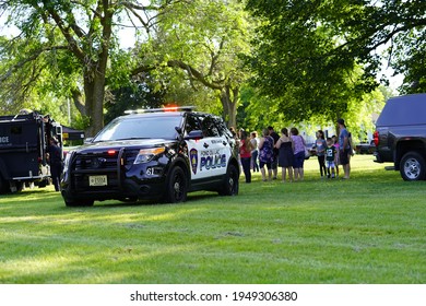 Fond Du Lac, Wisconsin USA - June 20th, 2020: Community Families And Children Enjoying Themselves With Local Police Officers And Sheriffs During Police Officer Appreciation Day.