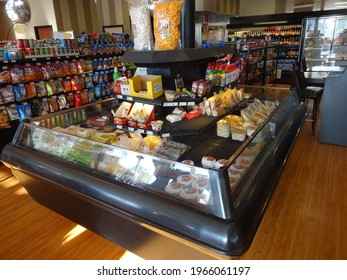 Fond Du Lac, Wisconsin USA - June 12th, 2020: Snack Food Cooler Islands Inside Of A BP Fuel Station Store Servicing Customers. 