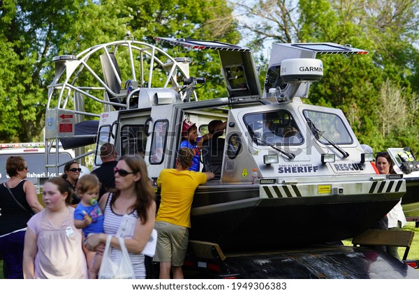 Fond du
Lac, Wisconsin USA - June 20th, 2020: Community families and
children enjoying themselves with local police officers and
sheriffs during police officer appreciation
day.