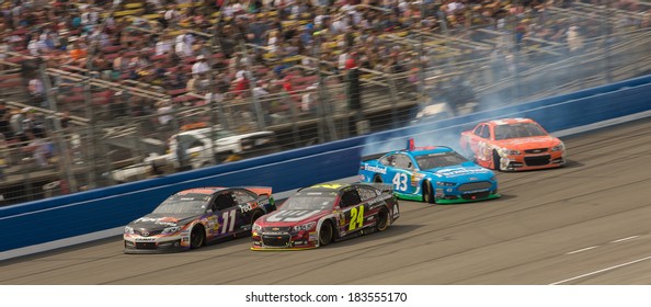 FONTANA, CA - MAR 23: Aric Almirola (43) And Brian Scott (33) Crash At The Nascar Sprint Cup Auto Club 400 Race At Auto Club Speedway In Fontana, CA On March 23, 2014