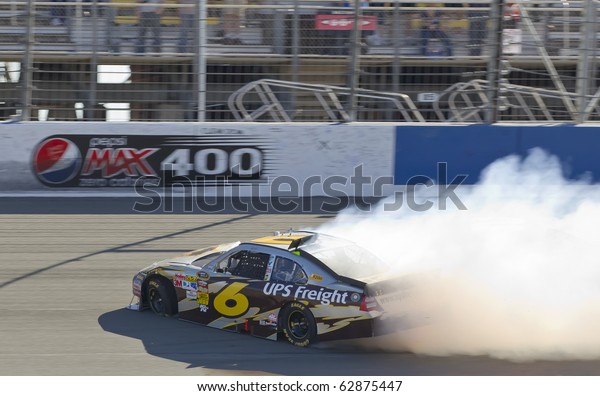 FONTANA, CA - OCT 10:  David Ragan spins off\
the frontstretch during the Pepsi Max 400 race at the Auto Club\
Speedway in Fontana, CA on Oct 10,\
2010.