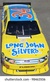 FONTANA, CA. - OCT 9: Sprint Cup Series Driver Travis Kvapil In The Long John Silver's #34 Car During The Pepsi Max 400 Practice On Oct 9 2010 At The Auto Club Speedway.