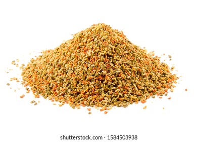 Food For Aquarium Fish Isolated On A White Background. Pile Of Granules To Feed Tropical Aquarium Fish. Granule Fish Food. Food For Fish In An Aquarium Isolated On White.