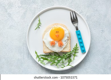 Food Art Chicken Sandwich For Kids. Cute Egg Sandwich Shaped As Chicken On White Plate. Top View